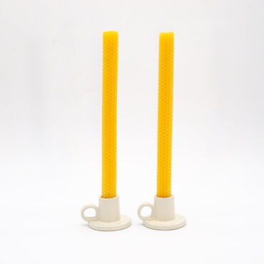 Beautiful pair of gold honeycomb taper candles in white holders.