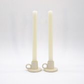 Beautiful ivory white taper candles in beeswax design